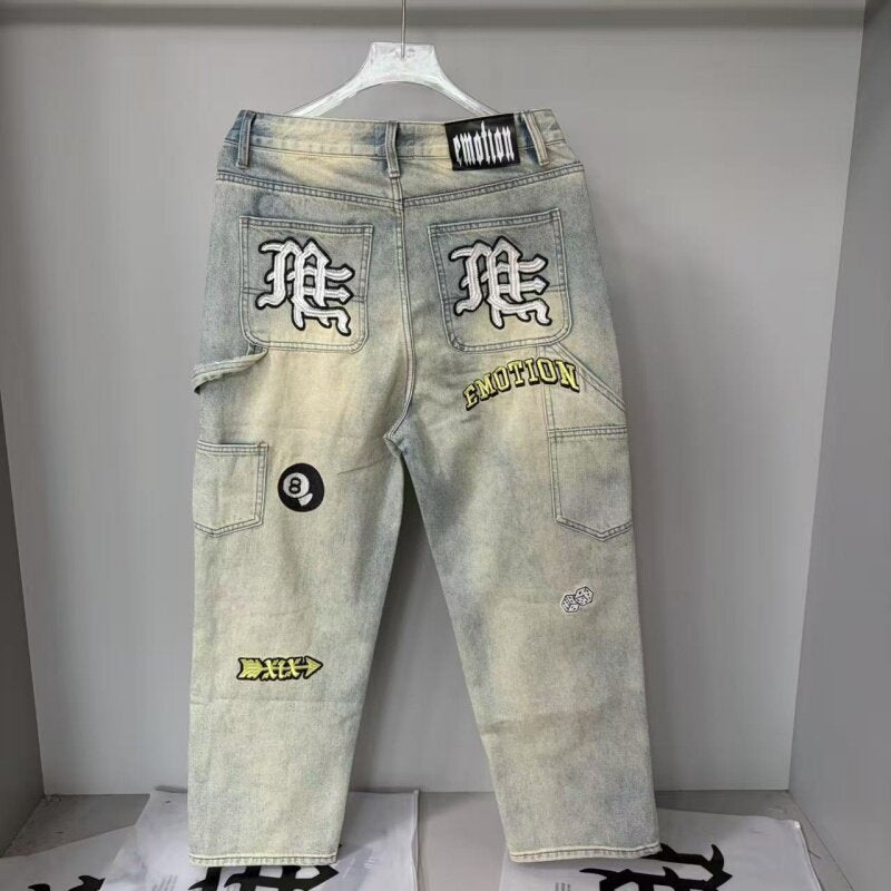 MIXED EMOTION Washed Distressed Patch Denim Pants